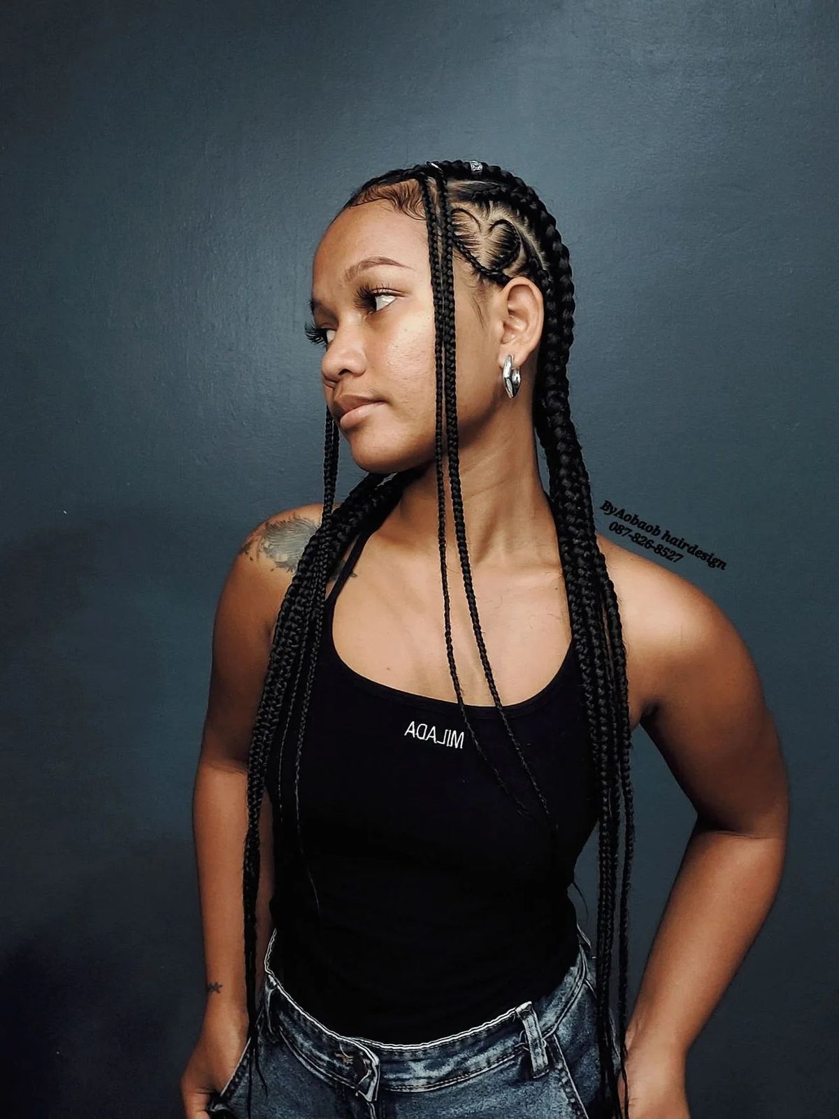 Long braids with side heart pattern